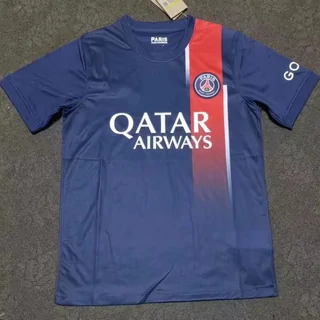 A navy blue football shirt with a red and white stripe and an airline sponsor across the chest