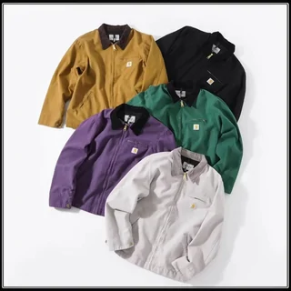 Six cotton work jackets in mustard, black, green, purple and cream, laid out together