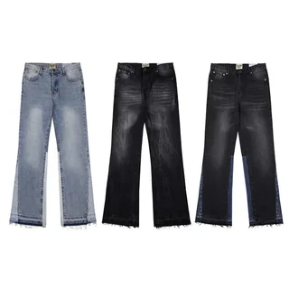 Three pairs of wide-leg jeans in light blue, black and washed black, hung side by side against white